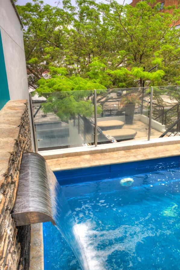 Casa De Leda, A Kali Hotel سانتا مارتا المظهر الخارجي الصورة A pool barrier