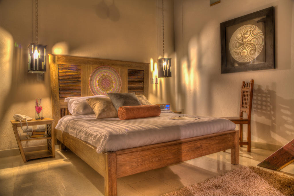 Casa De Leda, A Kali Hotel سانتا مارتا الغرفة الصورة A bedroom at the hotel