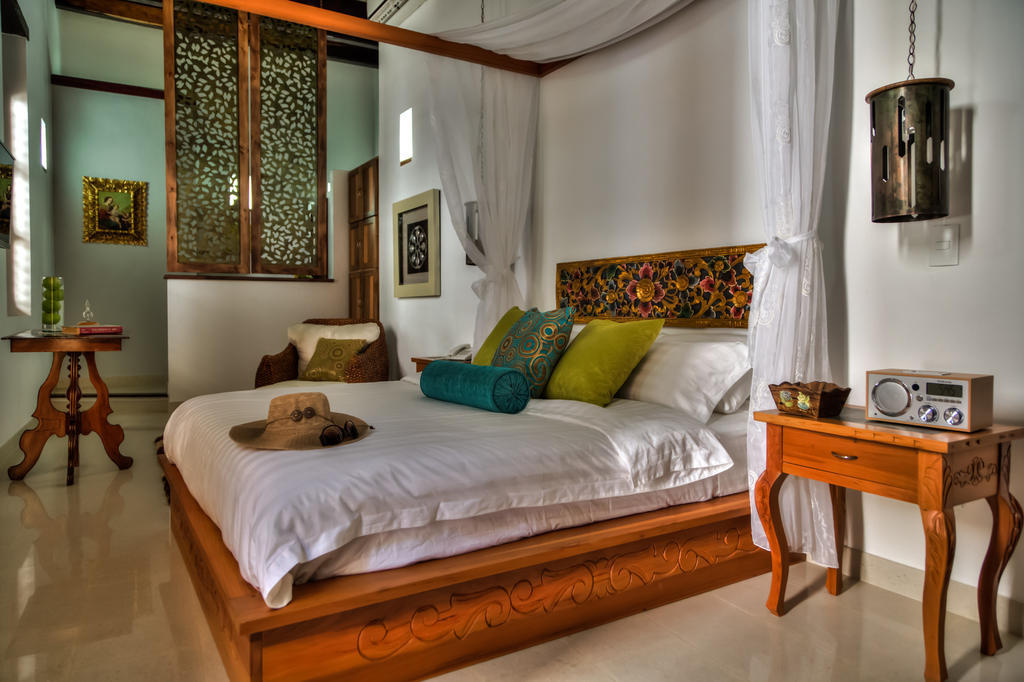Casa De Leda, A Kali Hotel سانتا مارتا المظهر الخارجي الصورة A bedroom at the resort