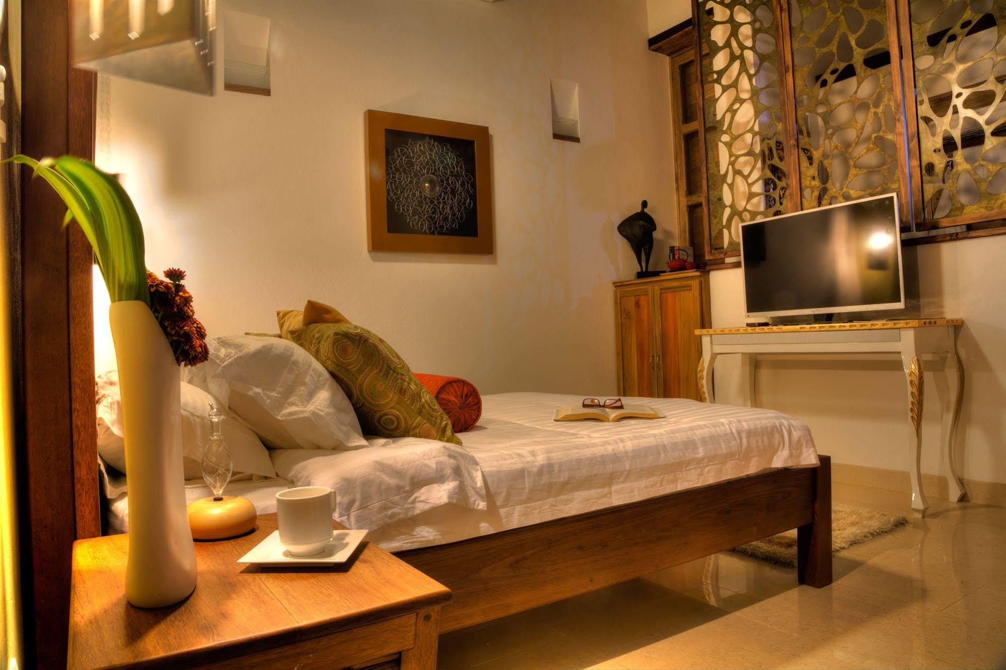 Casa De Leda, A Kali Hotel سانتا مارتا المظهر الخارجي الصورة A bedroom at the hotel
